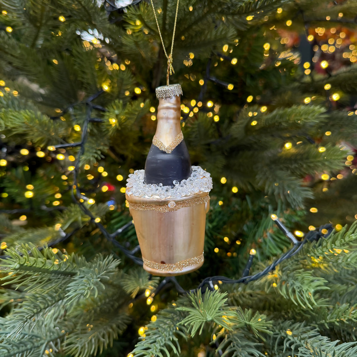 Champagne Bottle Bubbles on Ice Glass Bauble