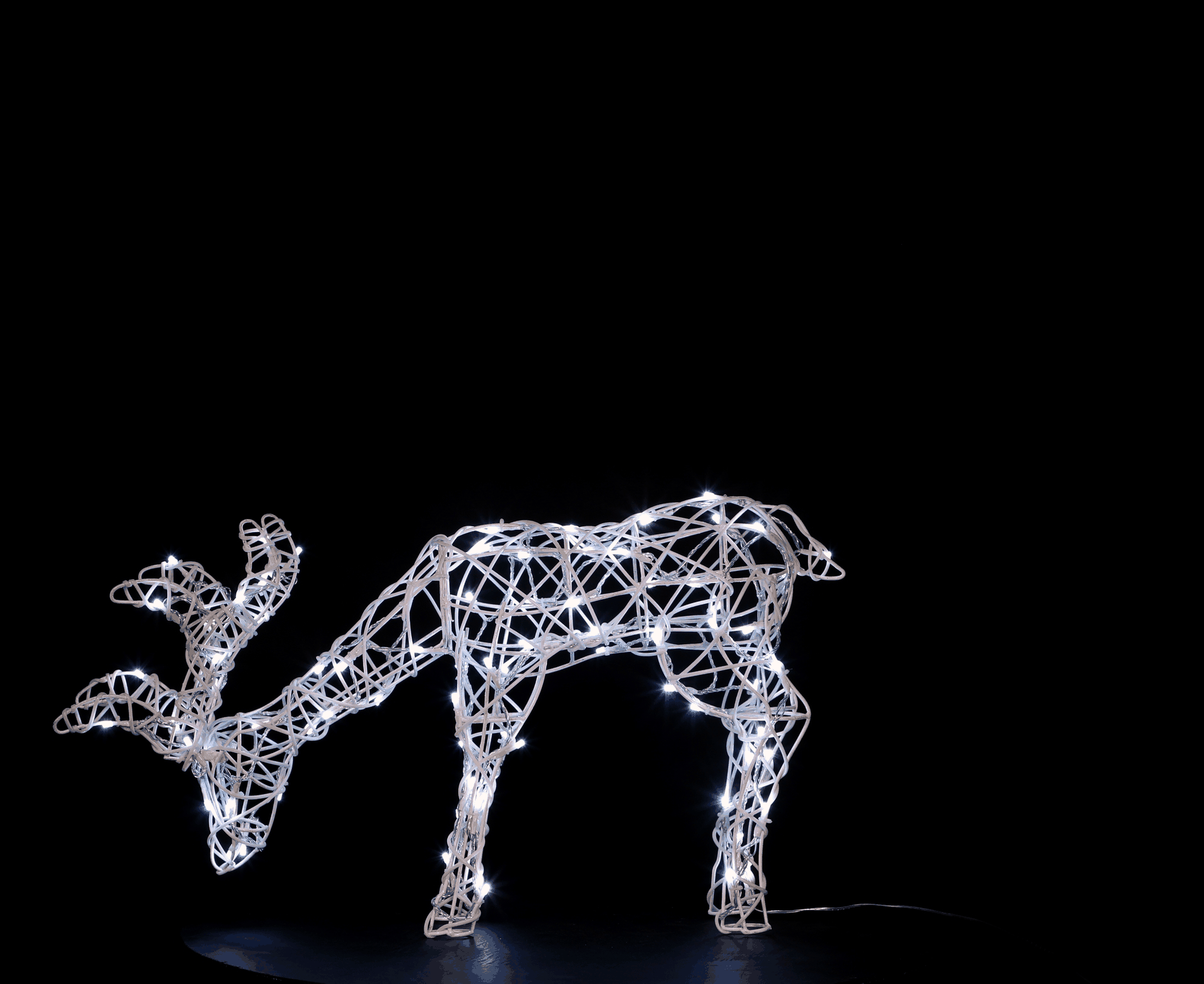 NOMA White Rattan 40cm Tatton Grazing Reindeer with 80 Colour Changeable LEDs & Remote Control