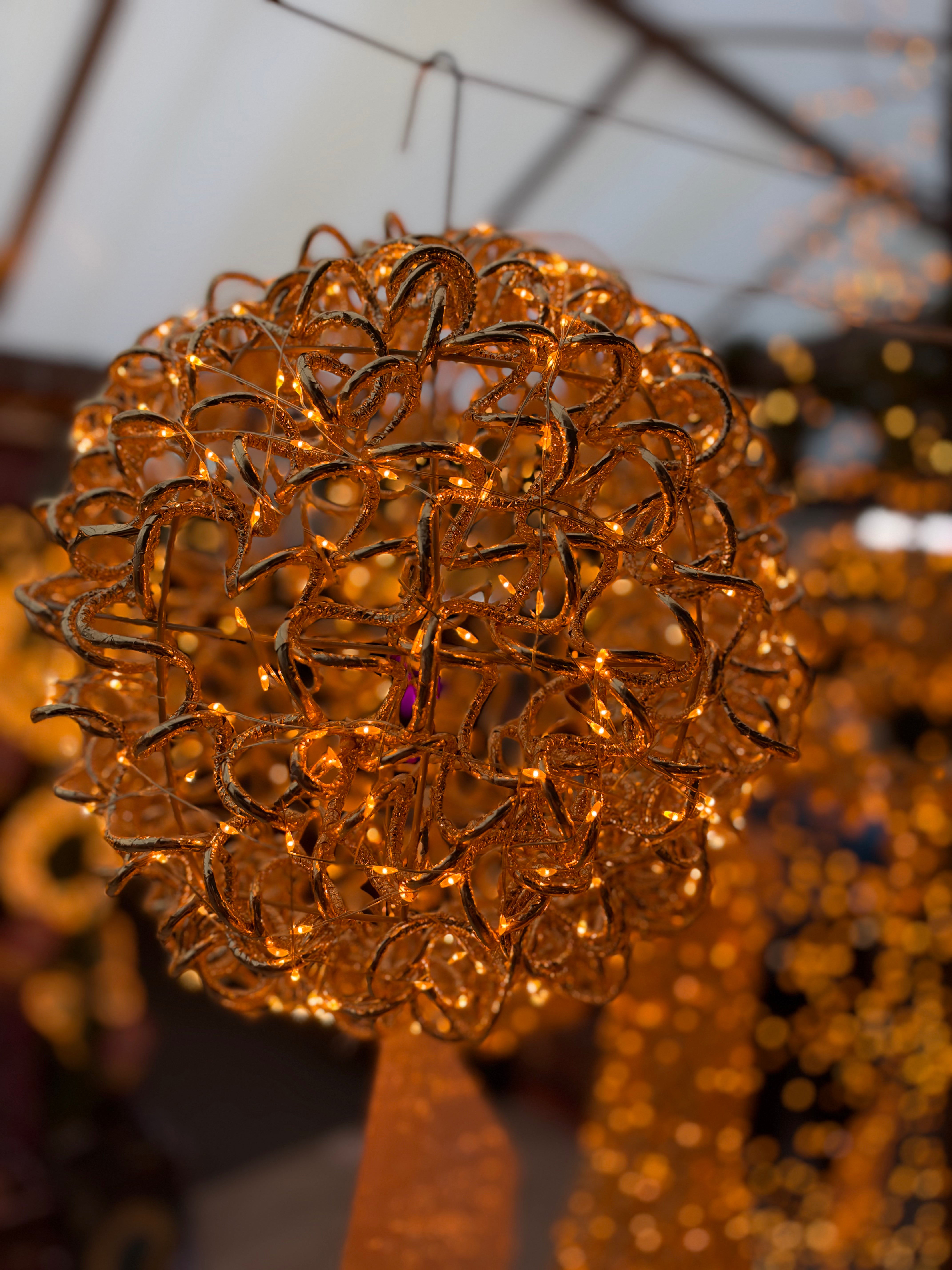 Lumineo 35cm Gold Coiled Hanging Ball Decoration with 400 LEDs Classic White Lights