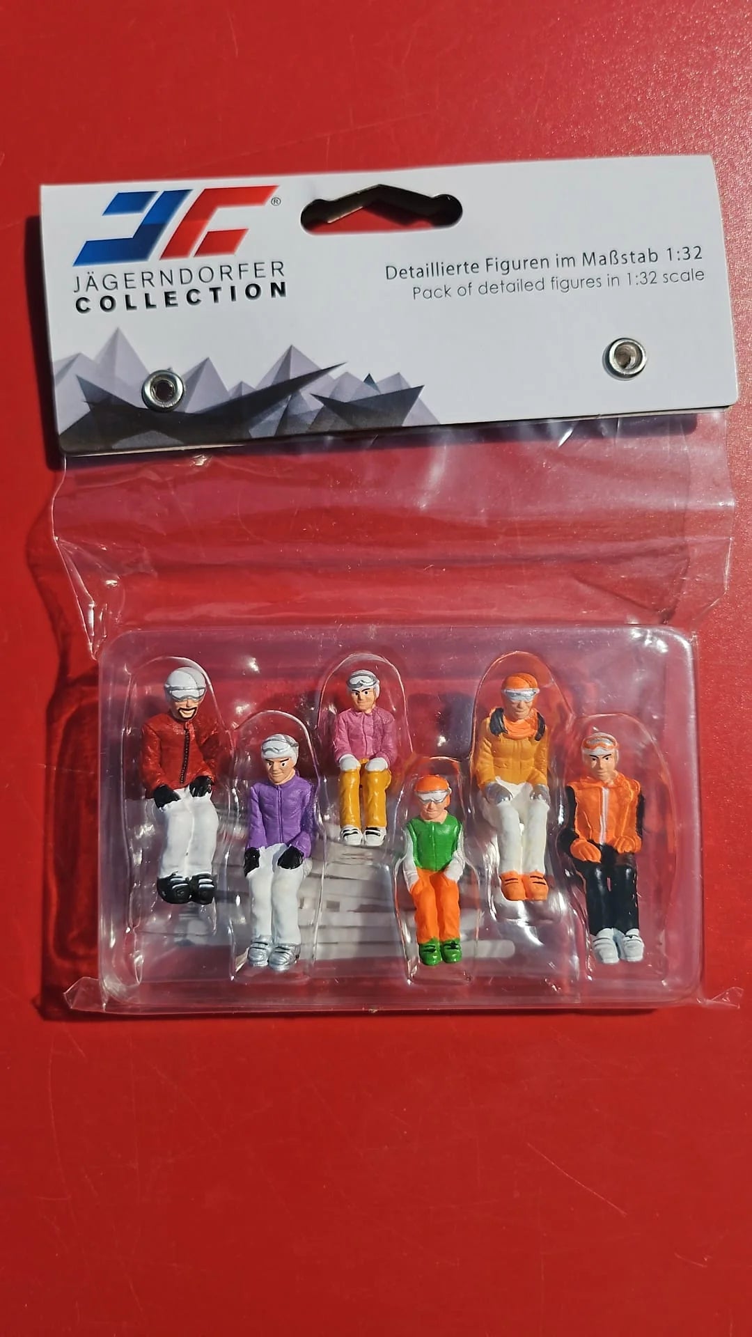 JägernDorfer Sitting Ski Figurines (Set of 6) - Blue or Orange Mix