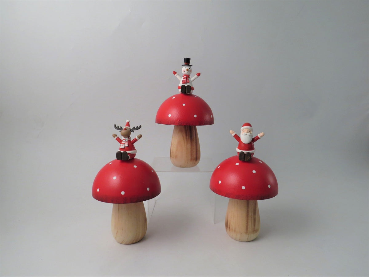 Wooden Toadstool with Christmas Figure on Top